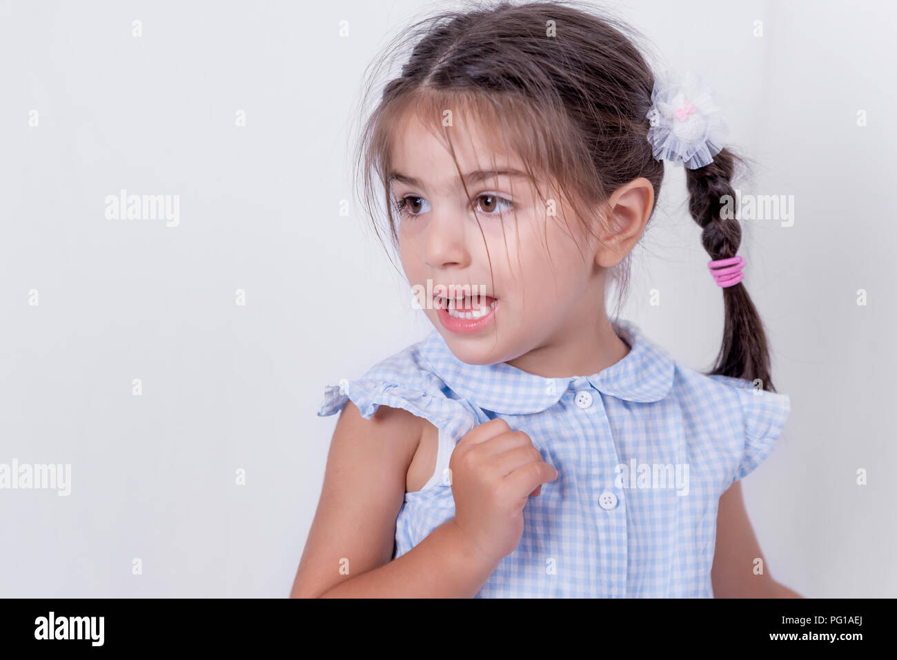 Portrait of cute girl in school uniform is ready to go school.Copy