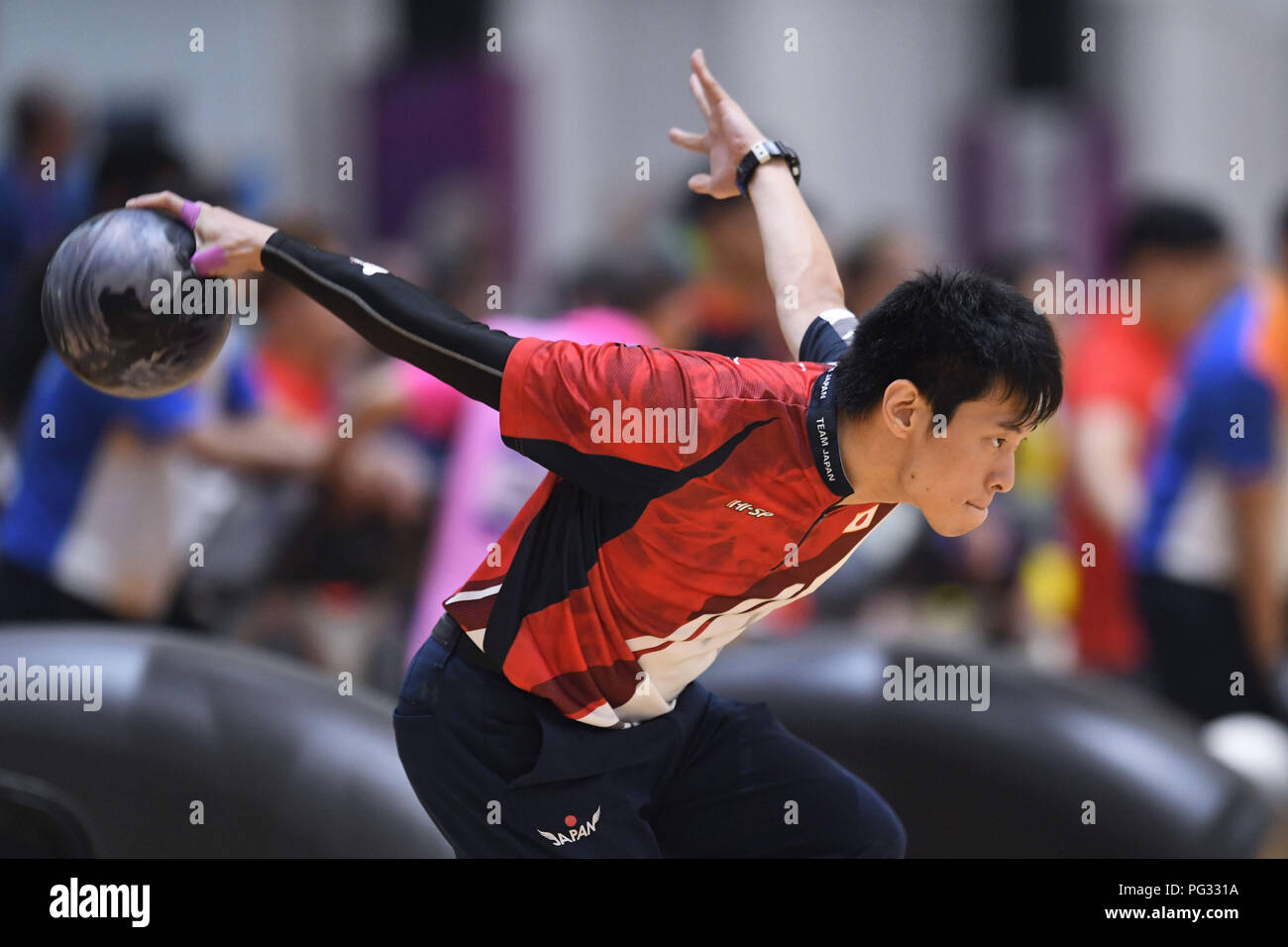 (180823)? PALEMBANG, Aug. 23, 2018 (Xinhua) -- Sasaki Tomoyuki of Japan competes during Bowling Men's Trios event at the 18th Asian Games in Palembang, Indonesia, Aug. 23, 2018. (Xinhua/Liu Ailun) Stock Photo