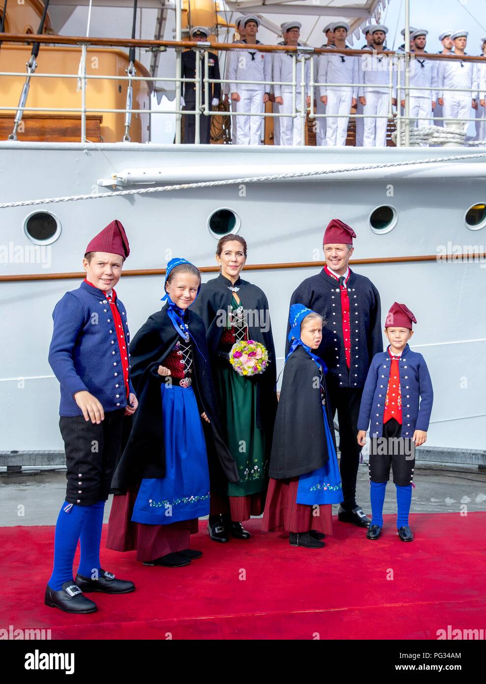 Torshavn, Faroe Islands, Denmark. 23rd Aug, 2018. Crown Prince Frederik, Crown Princess Mary, Prince Christian, Princess Isabella, Prince Vincent and Princess Josehpine of Denmark arrive with the The Royal Ship, HDMY Dannebrog at Bursatangi, on August 23, 2018, on the 1st of the 4 days visit to the Faroe Islands Photo : Albert Nieboer/ Netherlands OUT/Point de Vue OUT | Credit: dpa/Alamy Live News Stock Photo