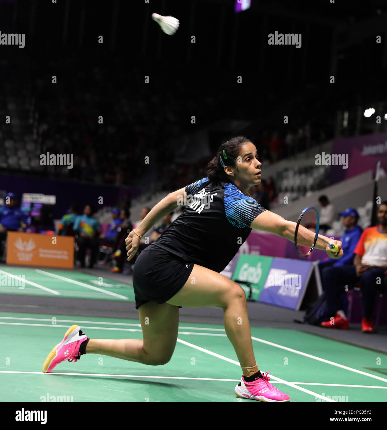 Jakarta, Indonesia, 23rd Aug 2018 Badminton Indias Star Shuttler Saina Nehwal strikes it back to her