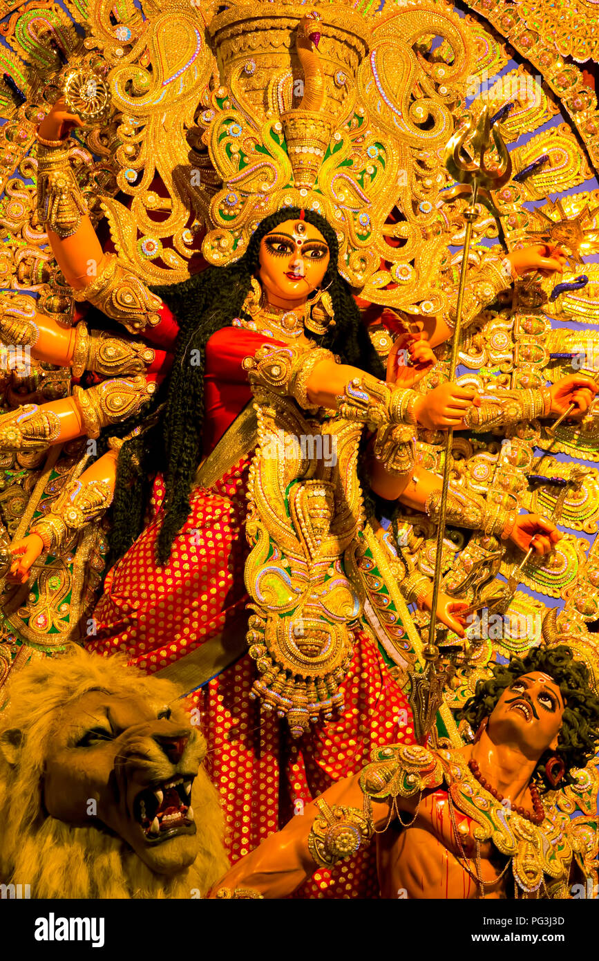 Goddess Durga,the Divine, Saviour,at war,against,the Devil,the Asura,Consort,Vivine Lion,Kolkata,Public worship,India. Stock Photo