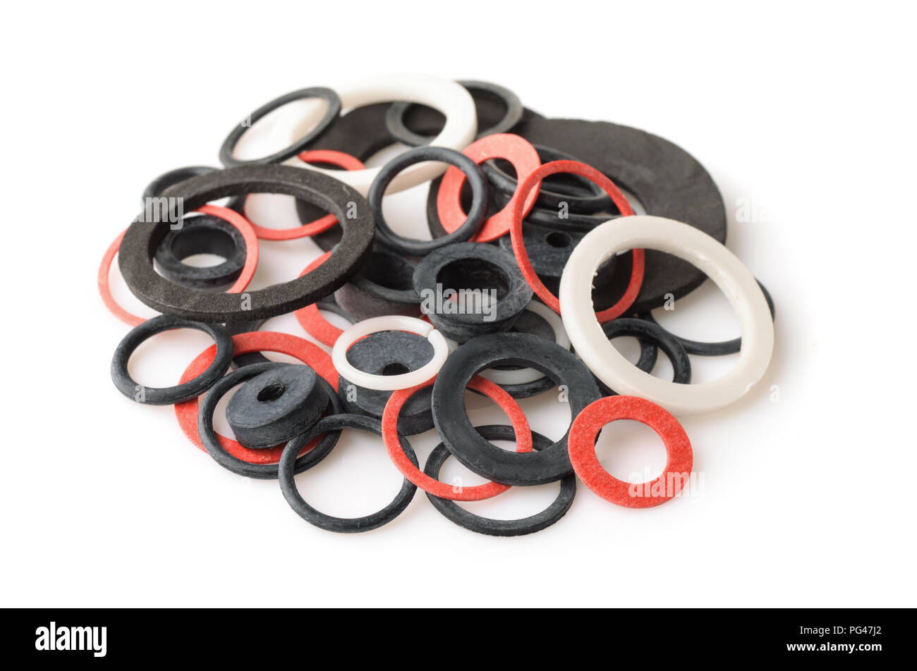 Pile of rubber gaskets and washers isolated on white Stock Photo