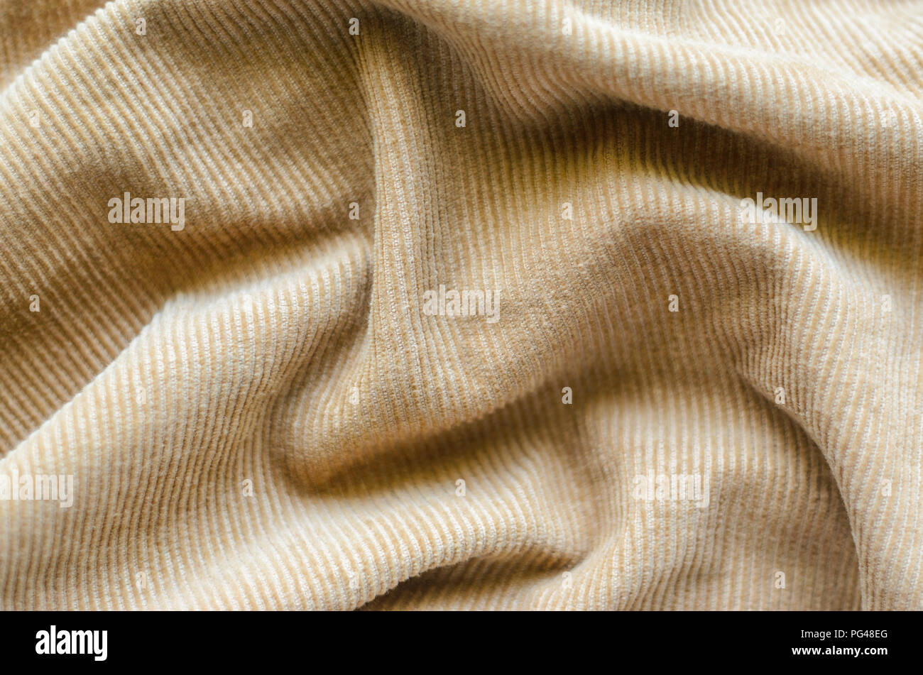 Texture of Soft Velvet Fabric with Folds Closeup. Texture of Beige ...