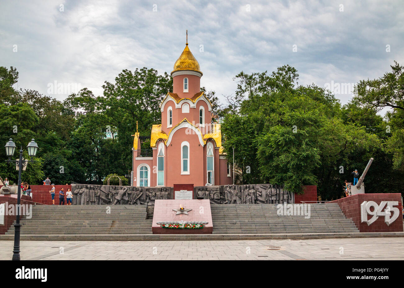 Shrine Chapel of St. Andrew and Eternal flame on the Memorial Fighting glory of the Pacific Fleet on the ship's embankment of Vladivostok Stock Photo