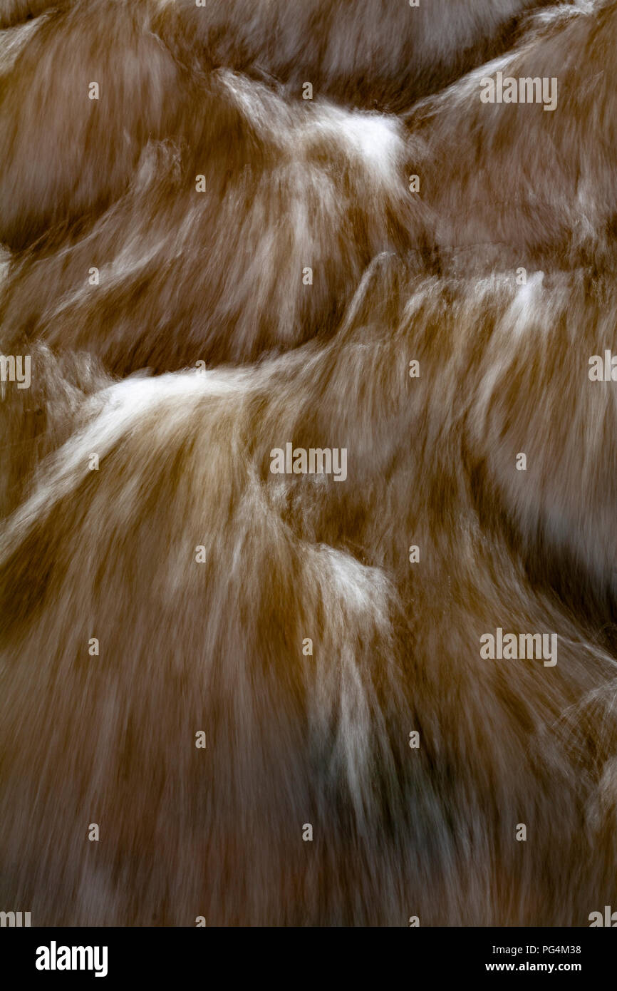 White water patterns in rapidly flowing river Stock Photo
