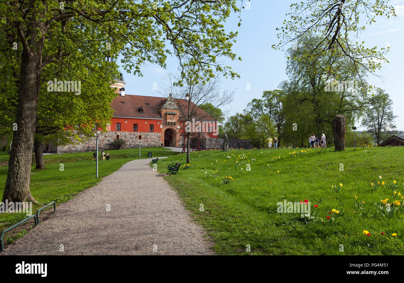 GRIPSHOLM CASTLE, SWEDEN ON MAY 11, 2018. View of the entry to the castle in springtime. Park, unidentified people. Editorial Stock Photo