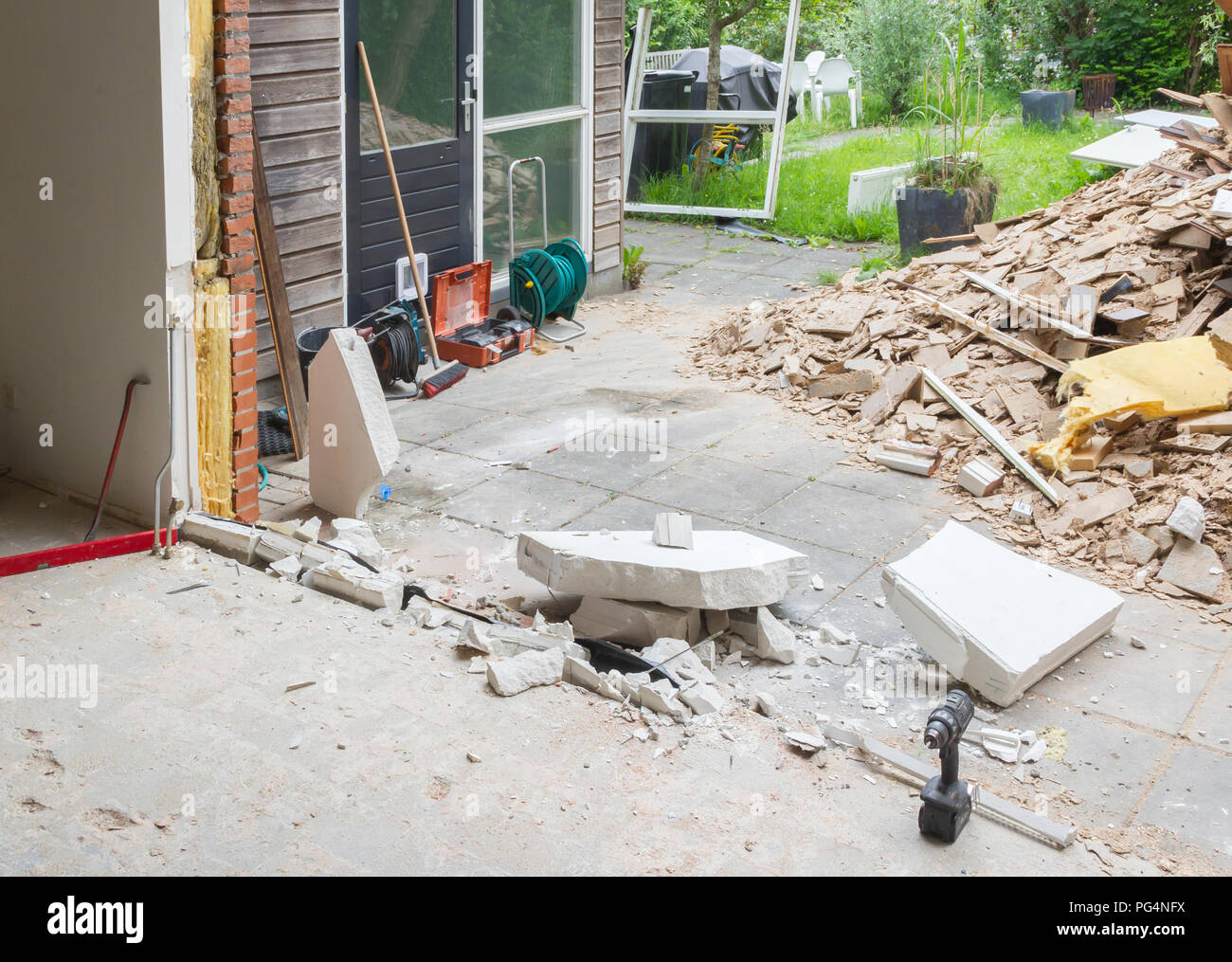 Removing a wall and placing a glass sliding door Remodeling a house Stock Photo Alamy