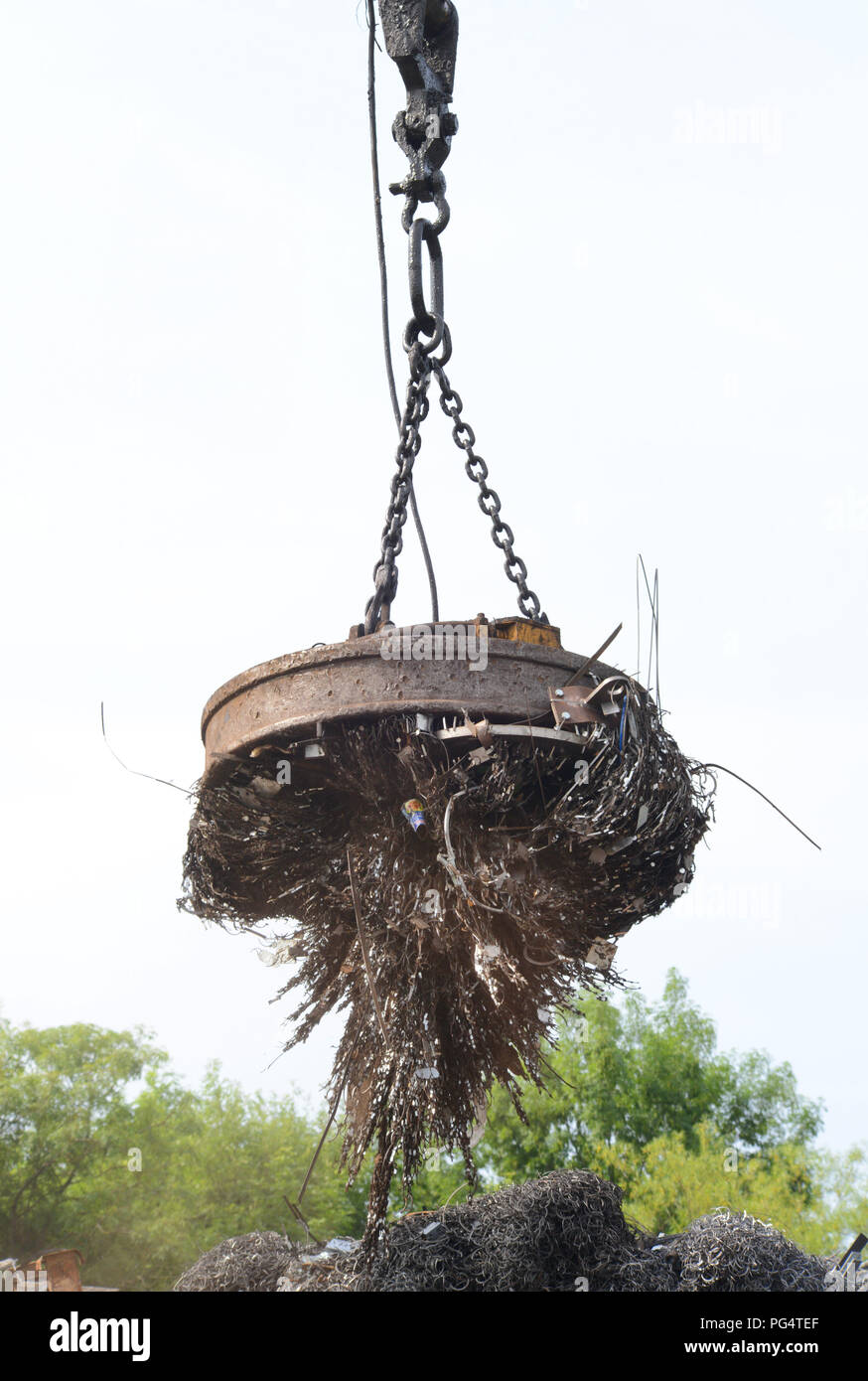on crane sorting through scrap metal at scrapyard leeds yorkshire united kingdom