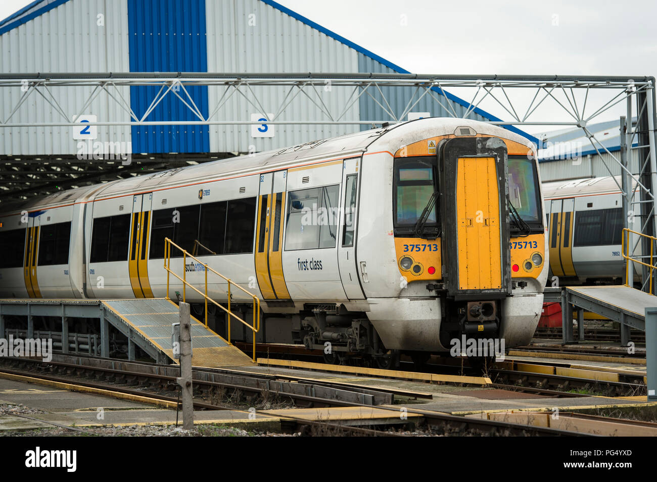 Class 375 passenger train in Southeastern livery in a railway depot in England. Stock Photo