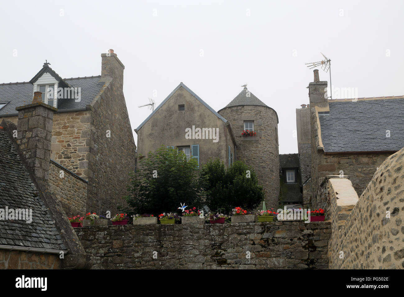View of backs of buildings from Quai Charles de Gaulle, Roscoff, Finistere, Brittany, France Stock Photo