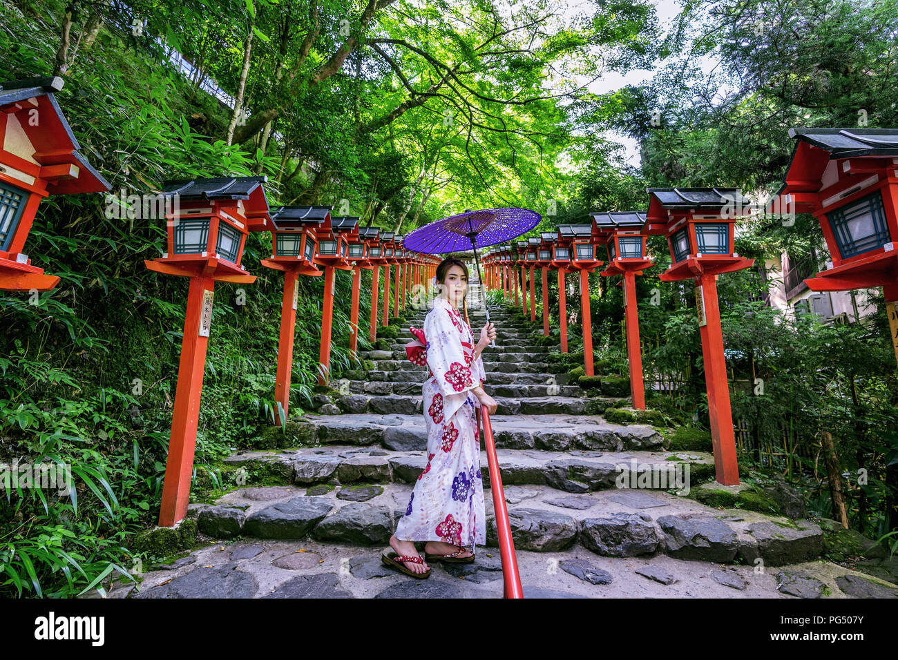 Asian woman wearing japanese traditional kimono at  Kifune Shrine in Kyoto, Japan. Stock Photo