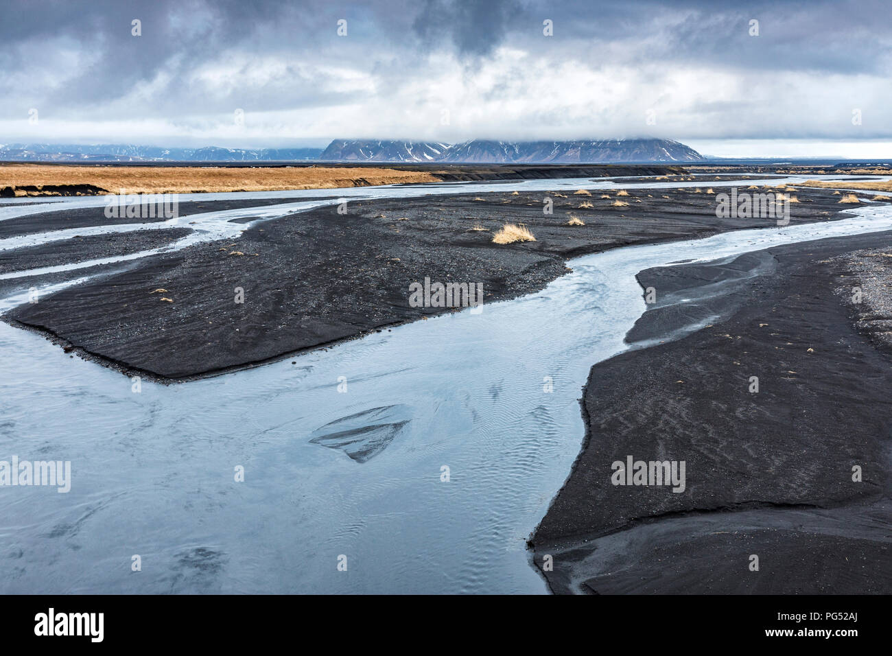 River delta in black desert near Lomagnupur in Iceland Stock Photo