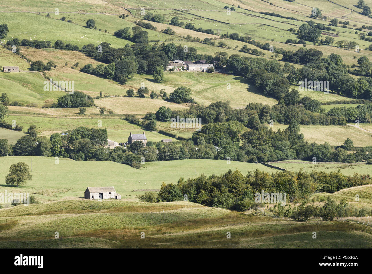 English countryside, rural England scene with stone farm houses amongst rolling green hills Stock Photo