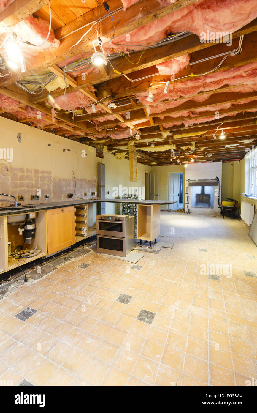 A kitchen is partially removed in a rip out prior to a renovation and refit Stock Photo
