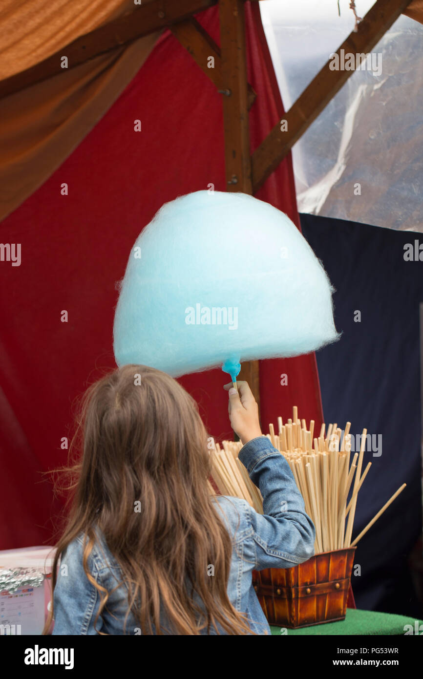 Rear view of a girl with cotton candy Stock Photo