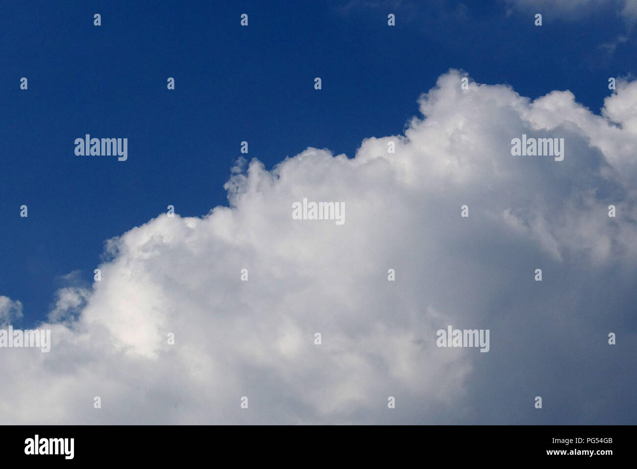 white clouds in blue sky background Stock Photo - Alamy