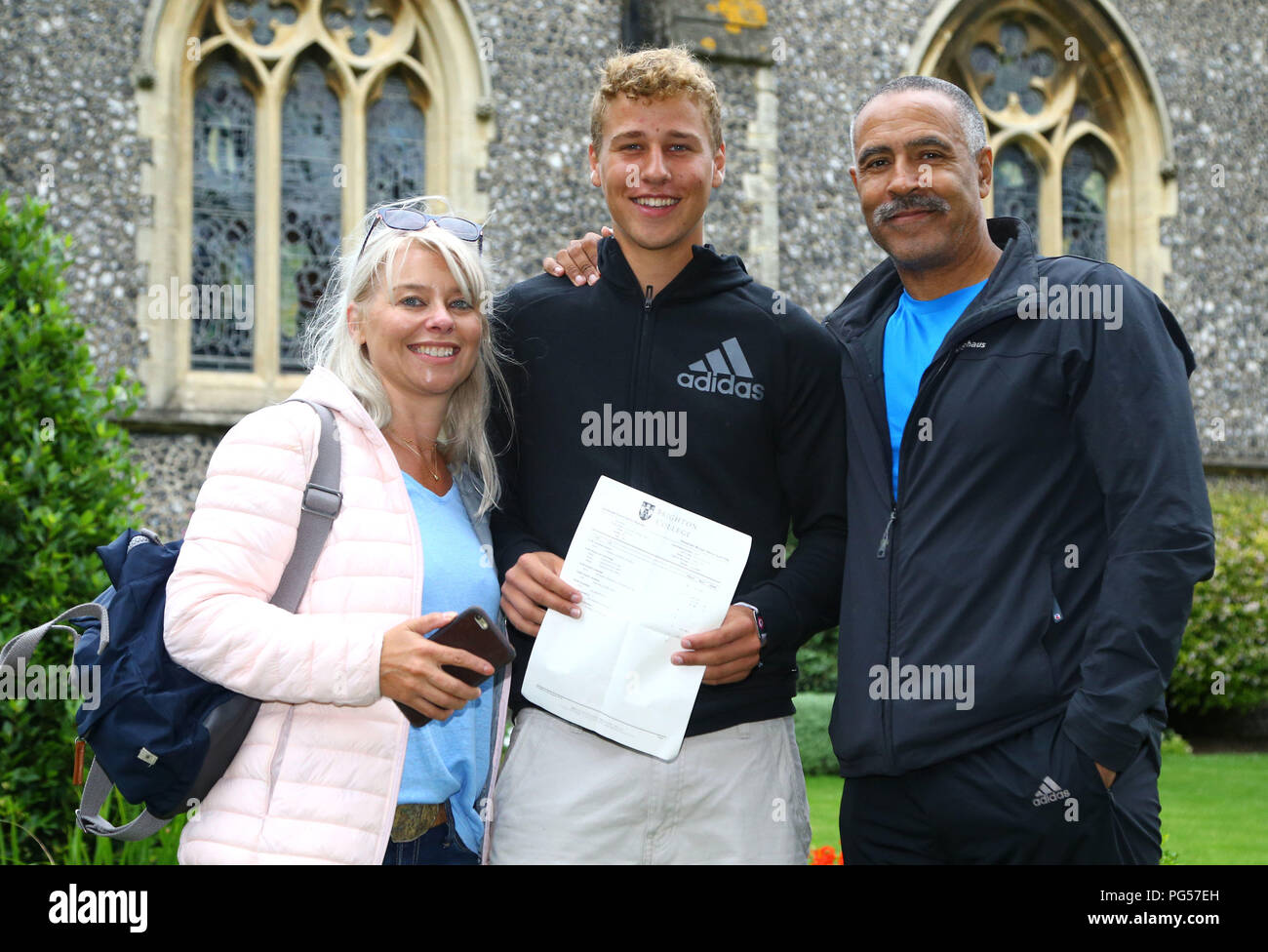 Alex Clayton celebrates with his father Olympic gold medalist Daley