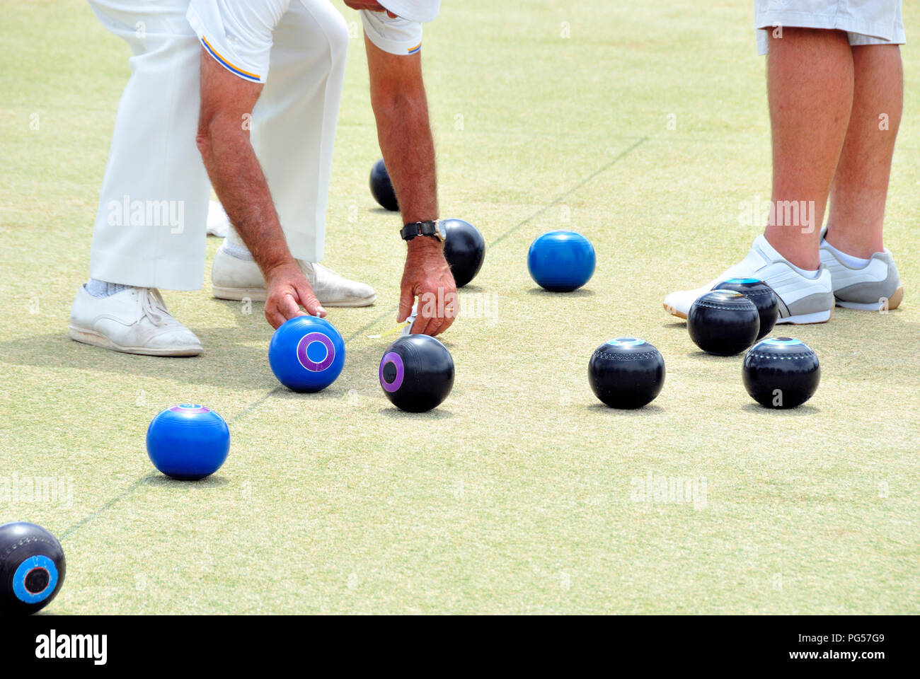 WUDINNA, AUSTRALIA-  FEBRUARY 02, 2018: Playing bowls. People bowling on a bowling green in Australia Stock Photo