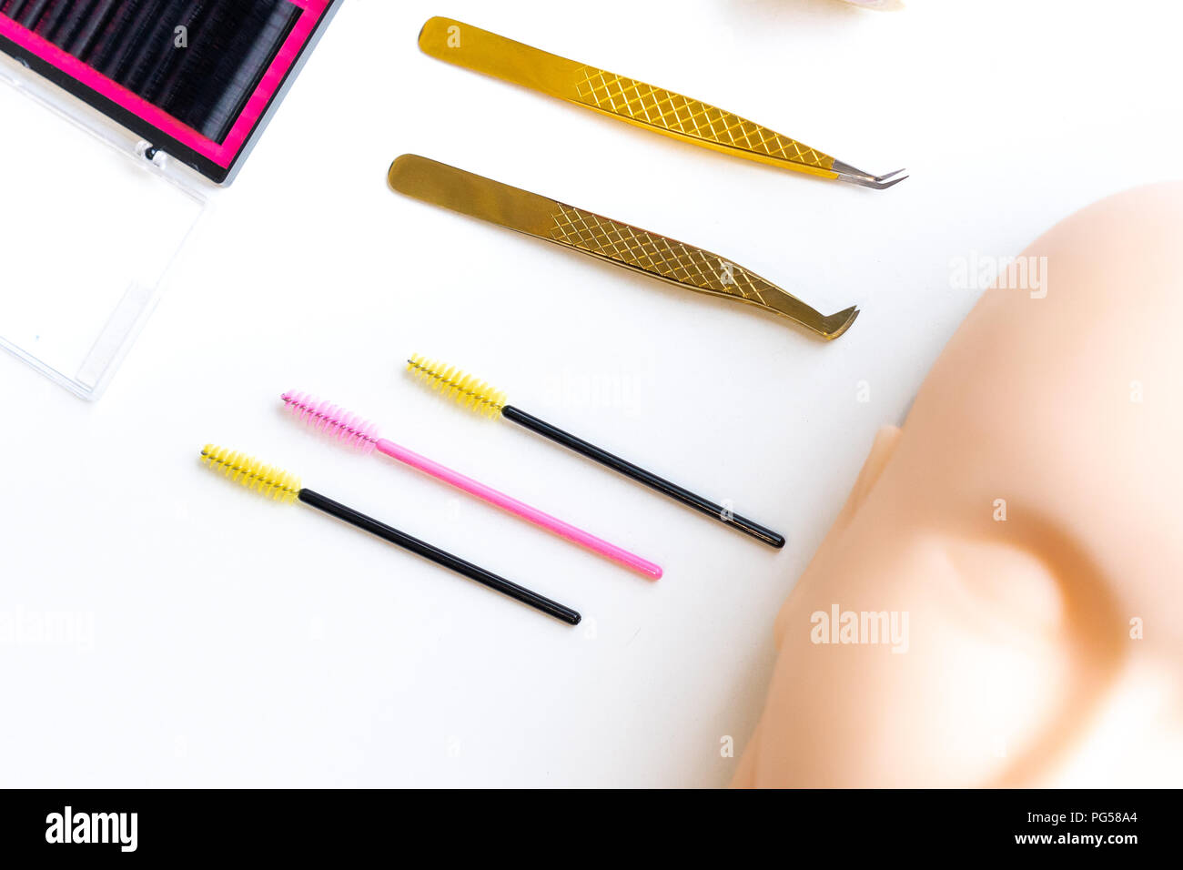 top view colourful of Micro Eyelash Brushes Mascara Wan and Twizzers Stock Photo