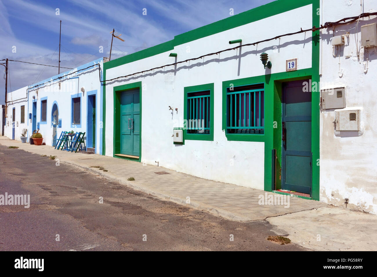 Traditional colourful Spanish houses in Salinas del Carmen, Fuerteventura Stock Photo