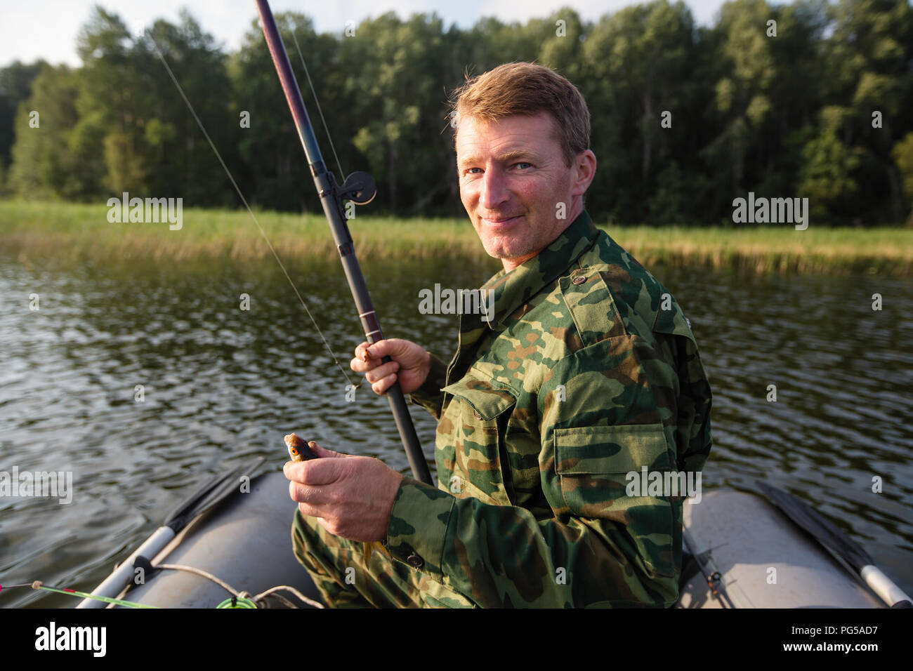 Rod with fish hi-res stock photography and images - Page 2 - Alamy