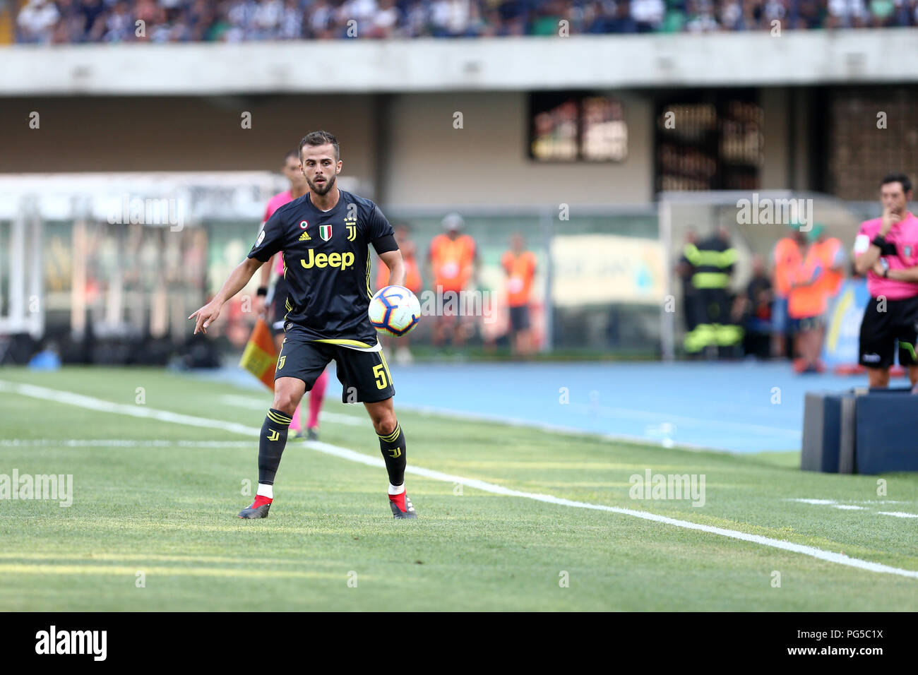 Miralem Pjanic of Juventus FC in action during the Serie A football match between Ac Chievo Verona and Juventus Fc. Stock Photo