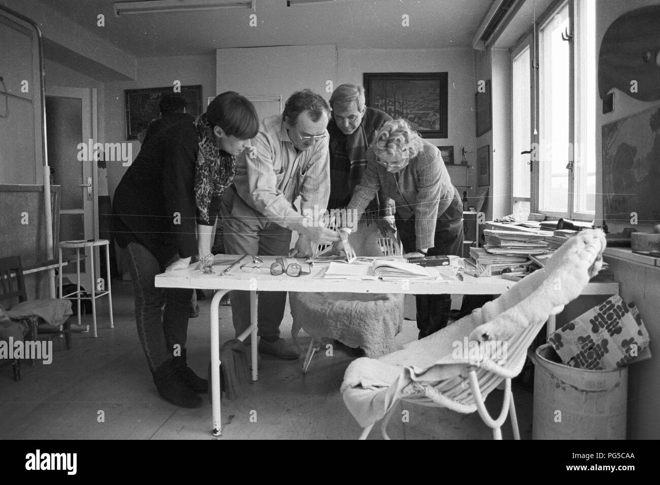 The Czech painter Zdenek Sykora with visitors in his studio in Louny. Sykora used a computer for the composition arrangements of his paintings, which he then transferred to the canvas in acrylic. From 1966 he was a lecturer at the Charles University in Prague. Stock Photo