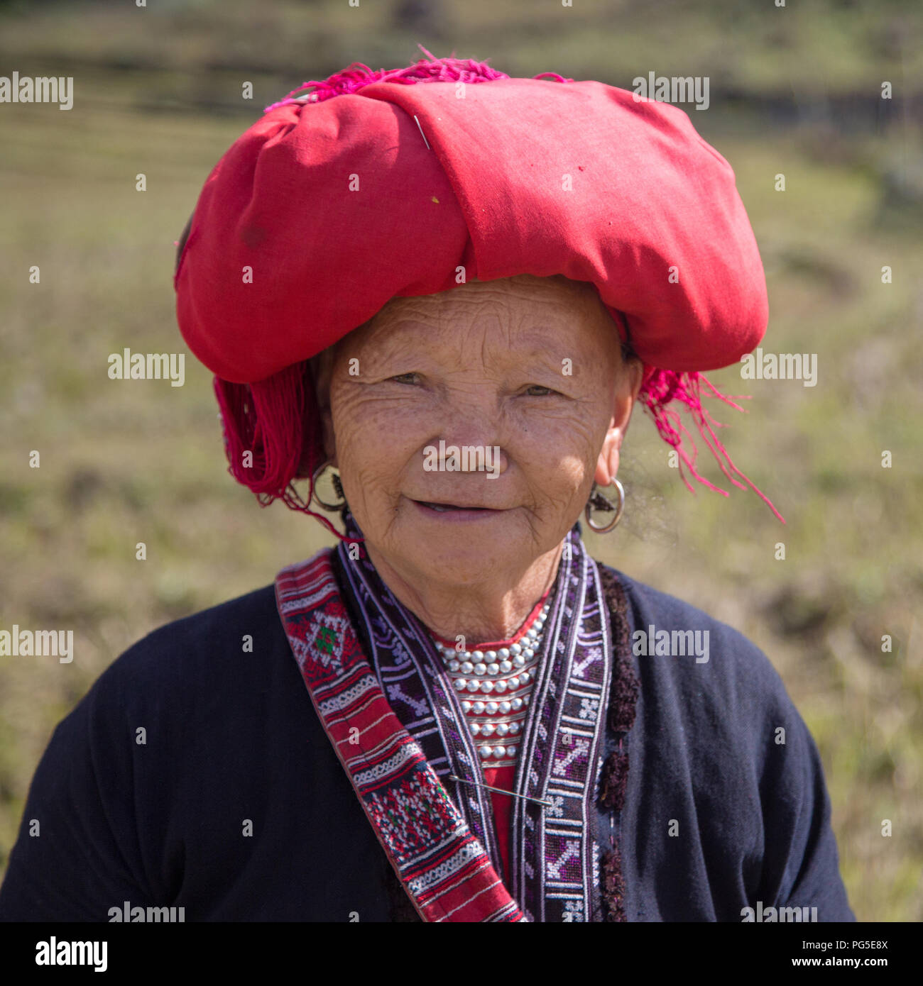 Elderly woman of the Red Dao community, near Sapa, Vietnam Stock Photo
