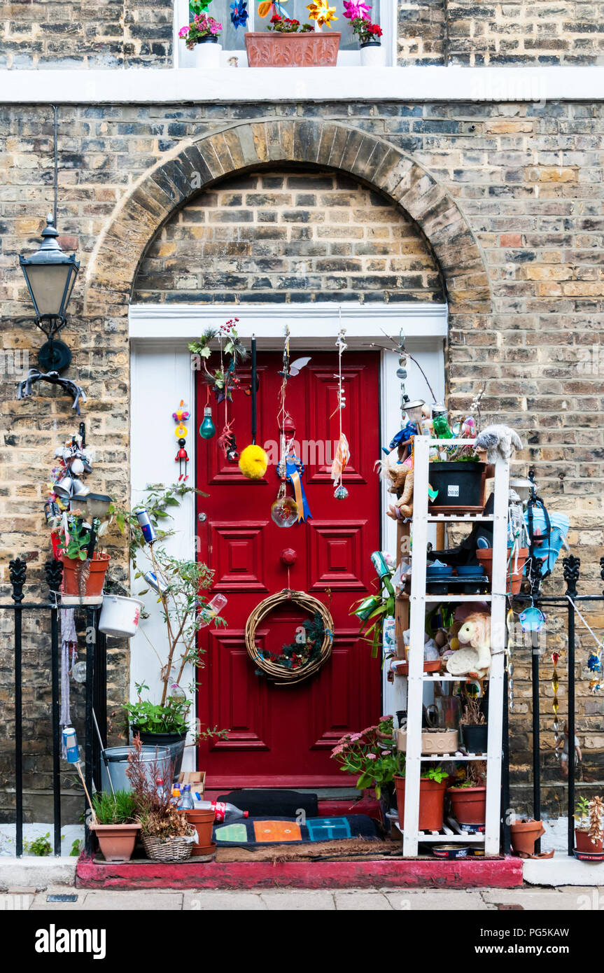 An enthusiastically decorated front door in Clerkenwell, London. Stock Photo