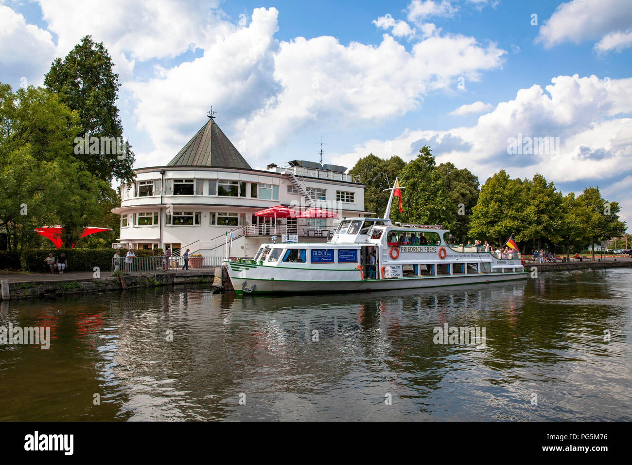 excursion boat on the river Ruhr at the Wasserbahnhof in Muelheim on the river Ruhr, Ruhr Area, Germany.  Ausflugsschiff auf der Ruhr am Wasserbahnhof Stock Photo