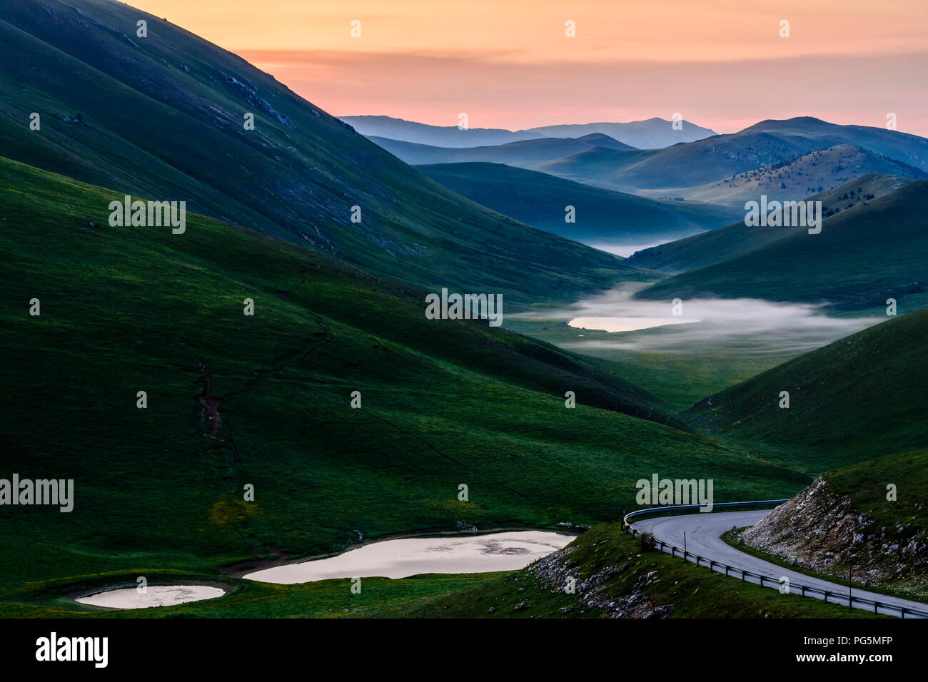 A valley of the Gran Sasso during the sunrise Stock Photo
