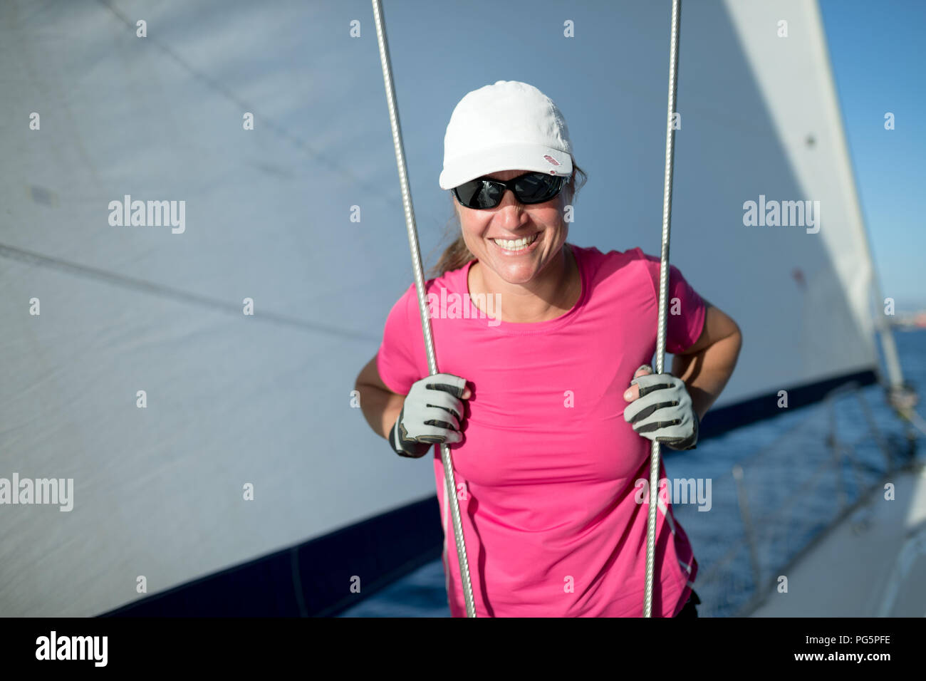 Happy strong woman sailing with her boat Stock Photo Alamy
