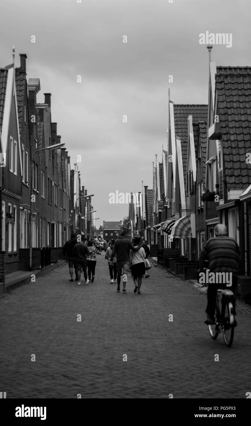 Bikes and tourists in Volendam (Netherlands) Stock Photo