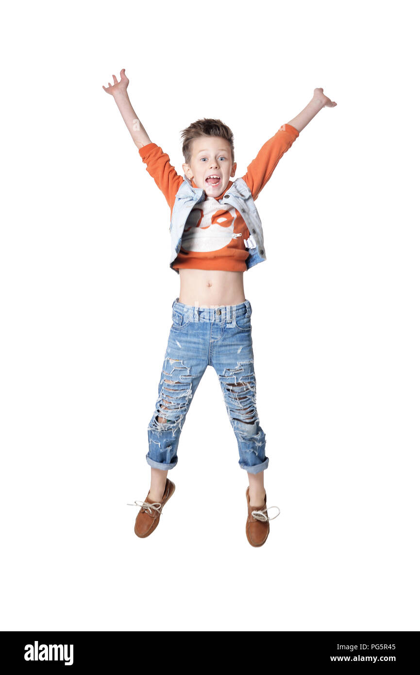 Excited 8year Old Mixed Race Boy Jumping On White Stock Photo - Download  Image Now - Child, Jumping, White Background - iStock