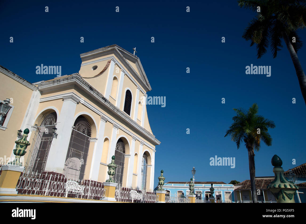 Angled view looking up at the front facade of the Iglesia Parroquial de la Santisima Trinidad church in the Plaza Major Trinidad Cuba Stock Photo