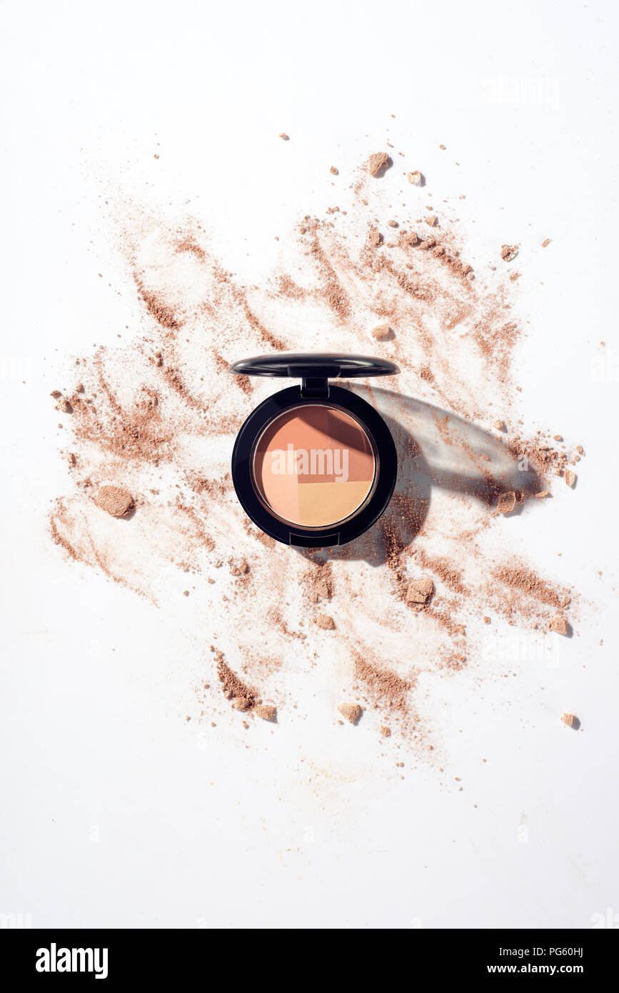 Scattered powder and contouring product on white background Stock Photo