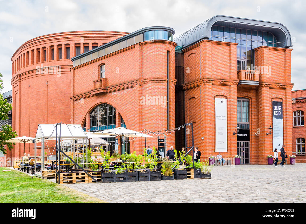 A massive red brick and glass building, part of the Stary Browar shopping centre in Poznań (Poznan), Poland Stock Photo