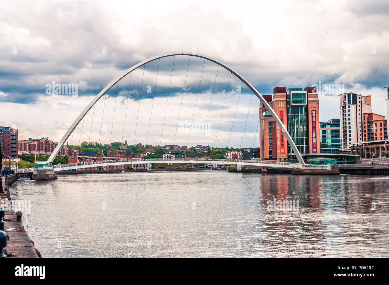 The Gateshead MIllennium bridge and BALTIC Centre in Newcastle, England, UK Stock Photo