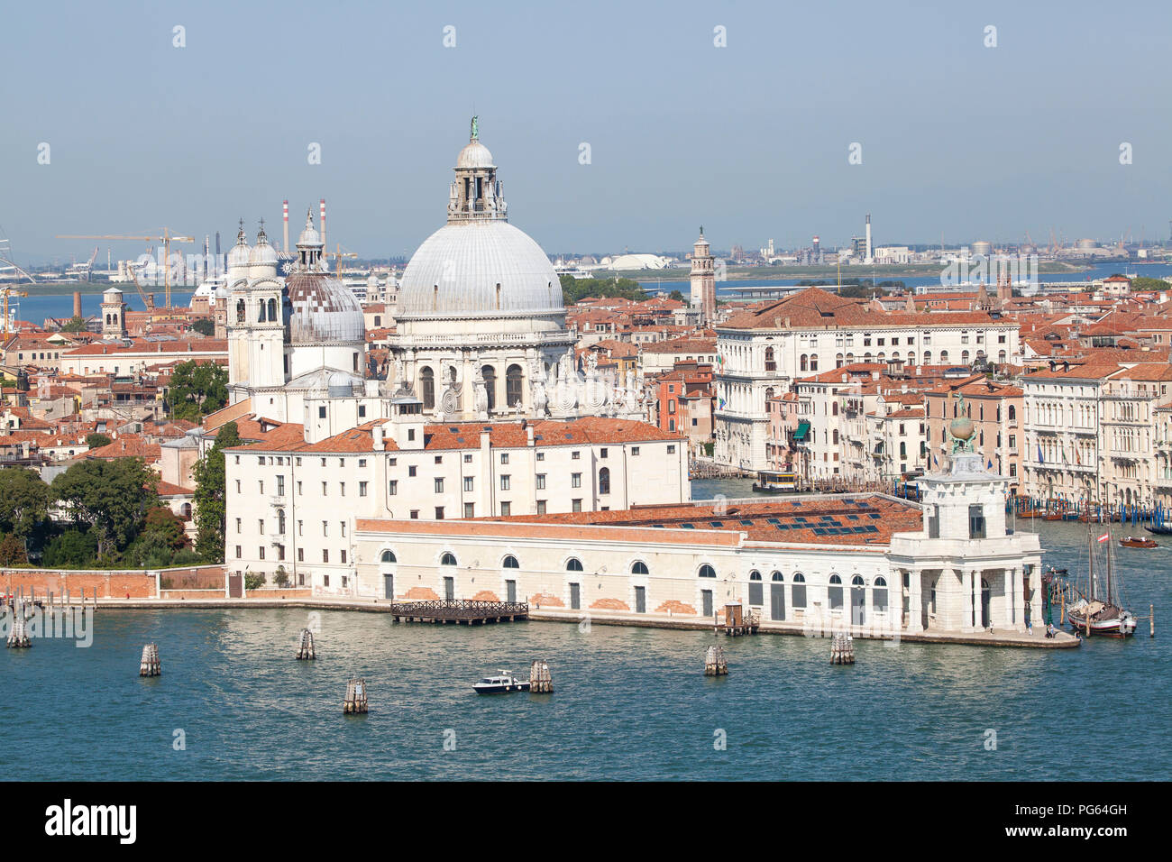 Aerial view of Punta della Dogana and Basilica di  Santa Maria della Salute, Venice, Veneto, Italy with the Giudecca Canal and Grand Canal. View to Ma Stock Photo