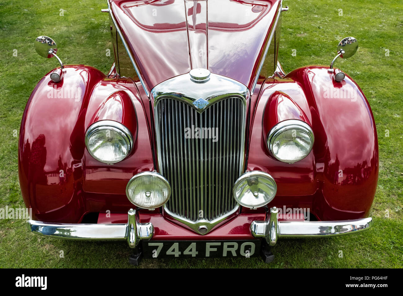 A Red Riley 2.5 litre drophead at a classic car show in Wales. Stock Photo