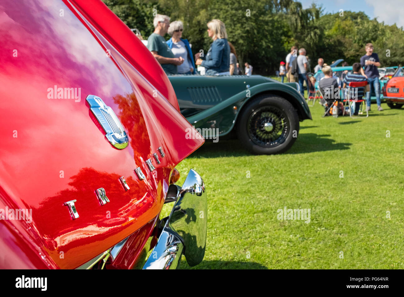 Red Triumph TR4 at a classic car show in Wales. Stock Photo