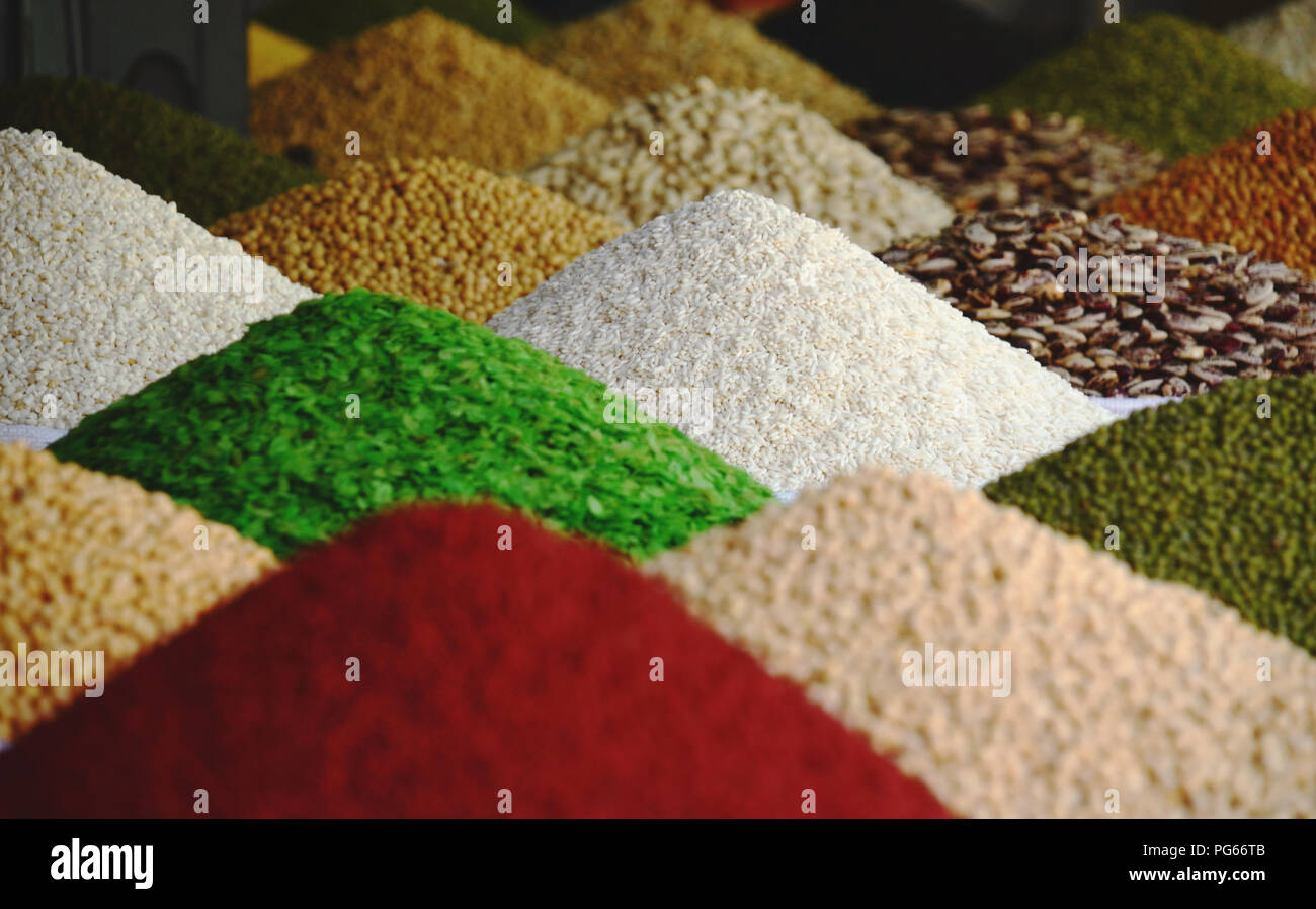 Food - seeds - spices - pattern. Nicely arranged food pattern - beans, seeds and rice - at Vietnamese market Stock Photo
