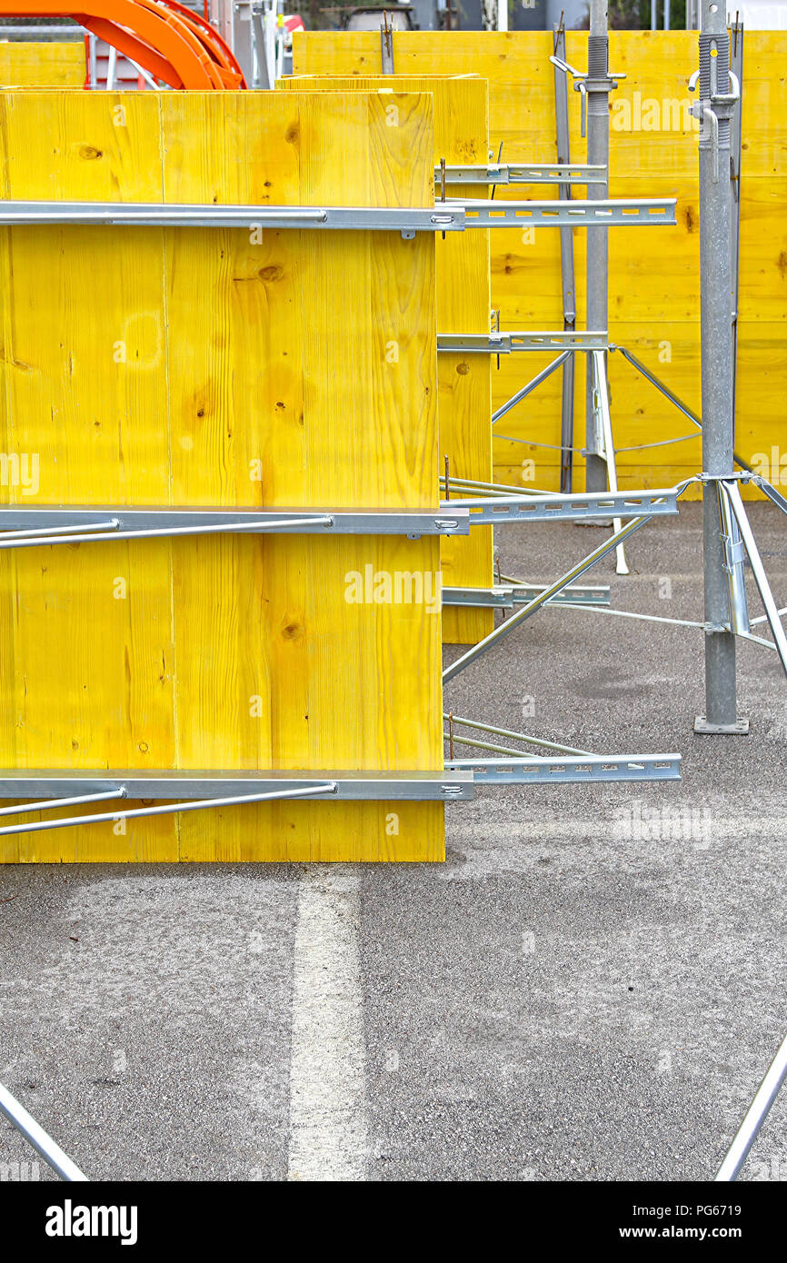 Yellow construction form for pouring concrete walls Stock Photo Alamy