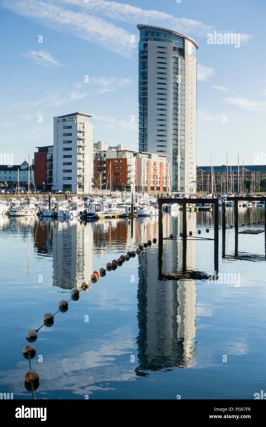 Contemporary housing including the Tower at Meridian Quay, Swansea Marina, in the old harbour. Stock Photo