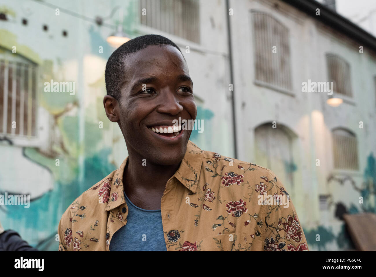 Joyful happy young man hi-res stock photography and images - Alamy