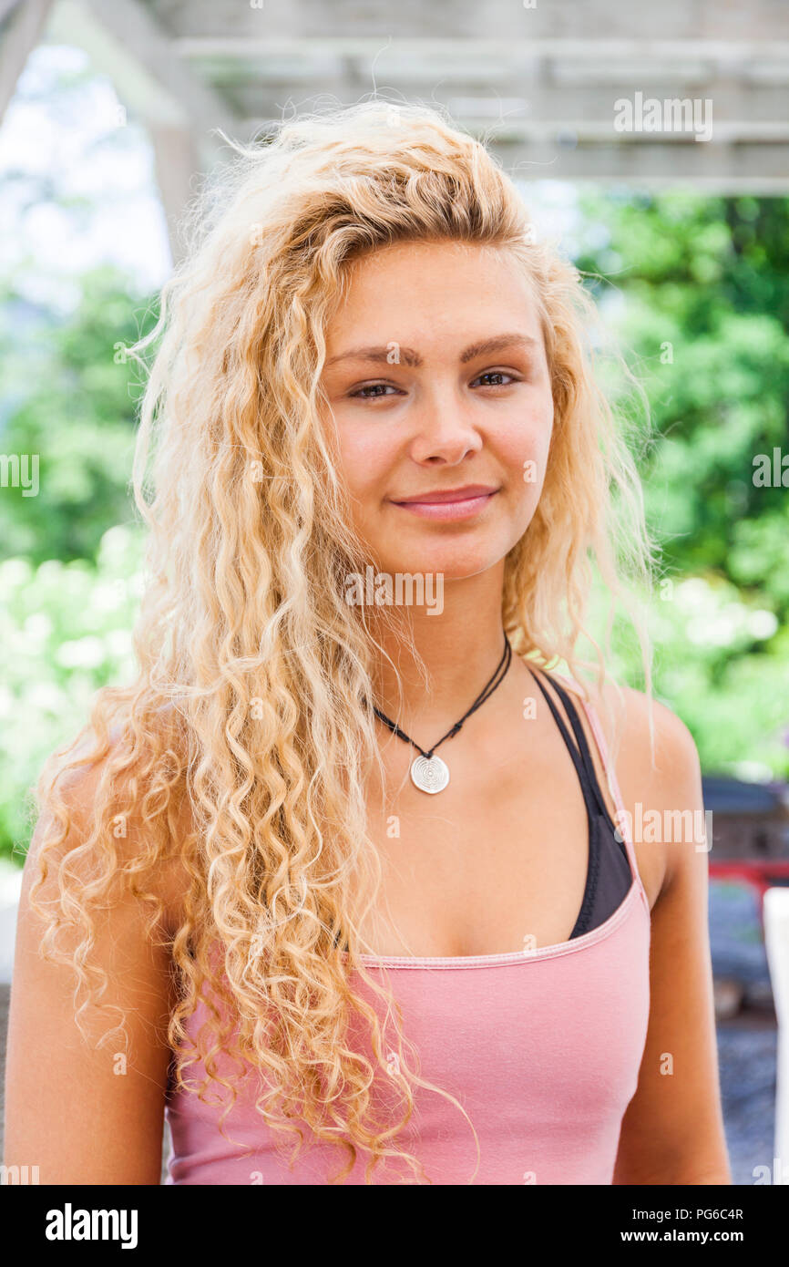 Portrait of smiling blond woman Stock Photo