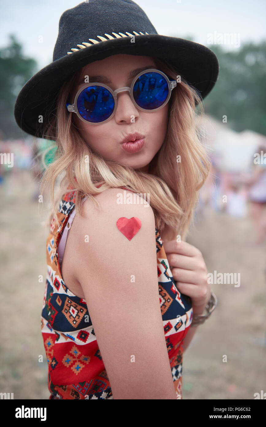 Portrait of hipster woman at the music festival Stock Photo