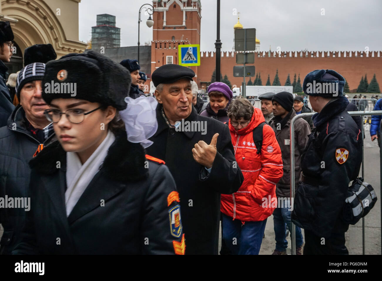 Moscow, Russia. 7th November, 2017. The centenary of October Revolution was celebrated on the Red Square by Russian army with a parade. Some people attended the celebrations with military uniforms. Stock Photo