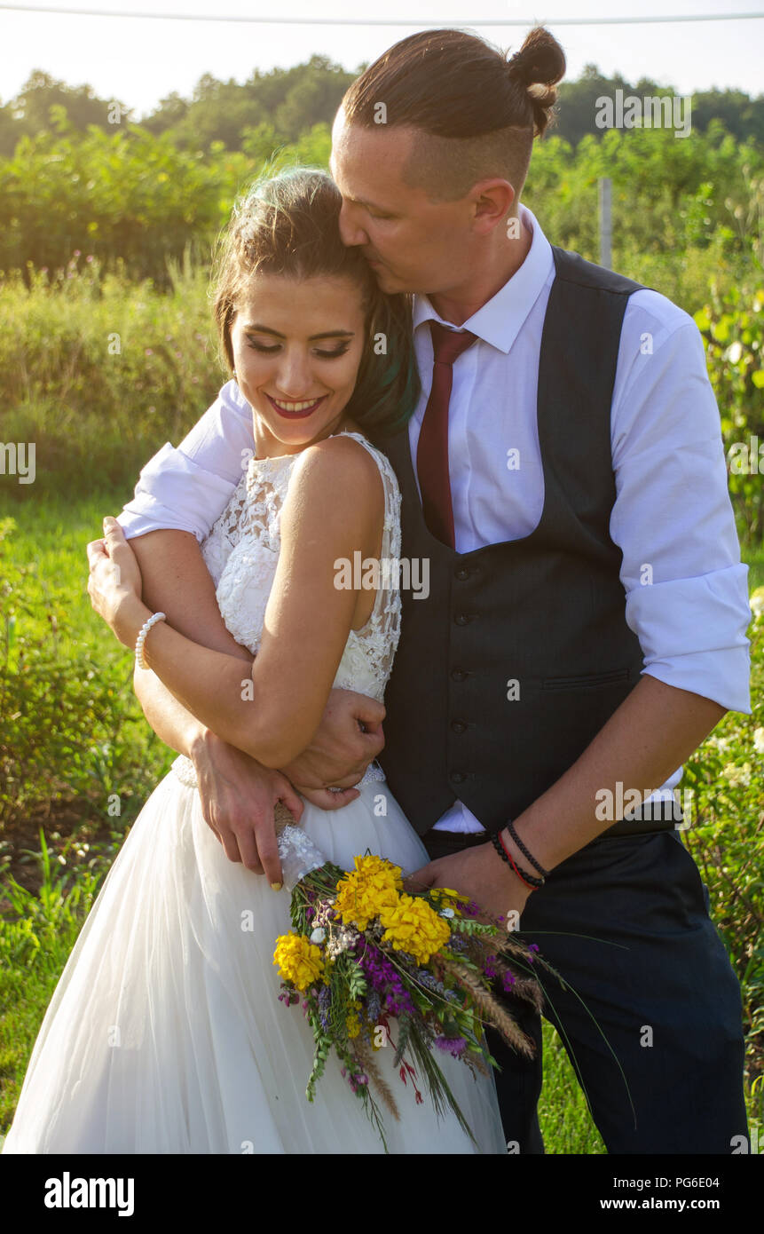 Happy bride and groom after wedding ceremony Stock Photo - Alamy