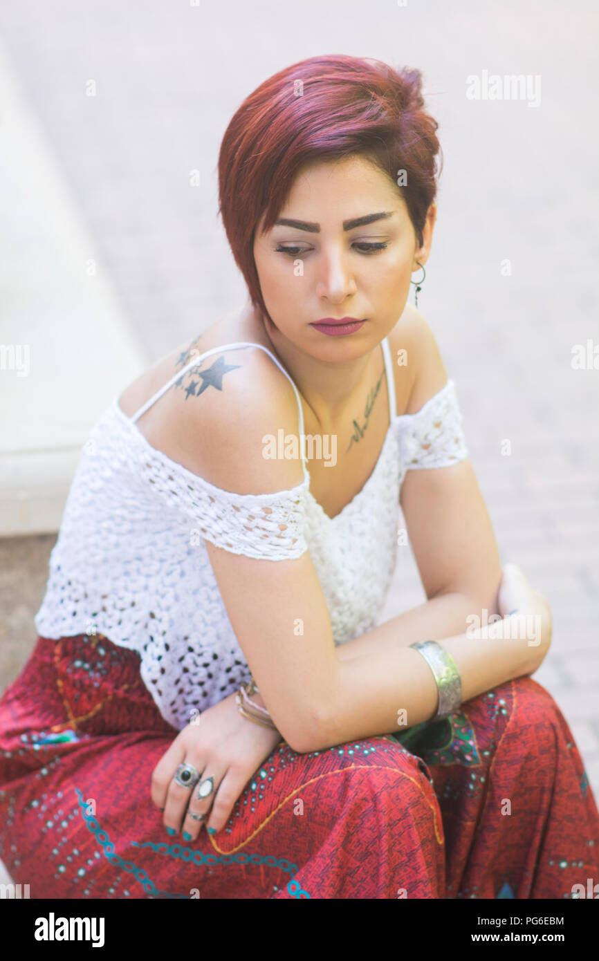 Woman alone in street hi-res stock photography and images - Alamy